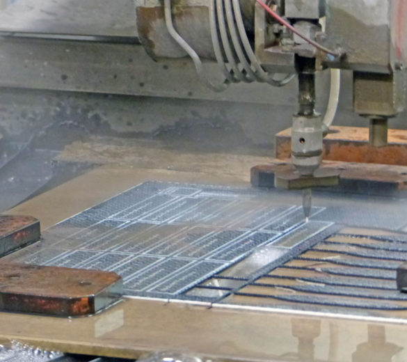 Water jet cutting - machining a composite composite coupons - ORATECH